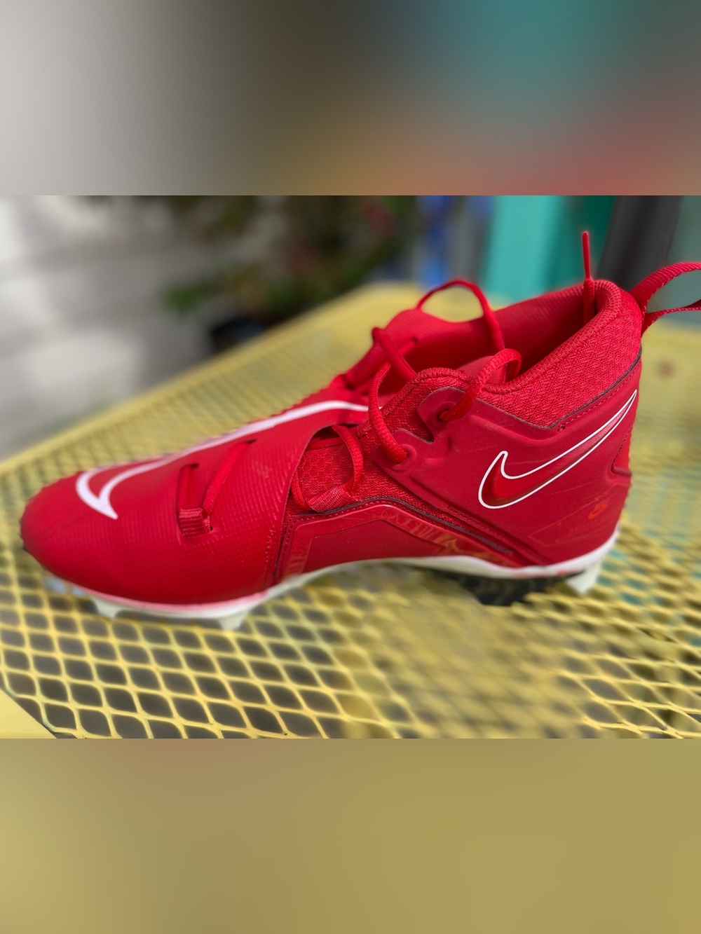 Nike Red Athletic Cleats with White Swoosh